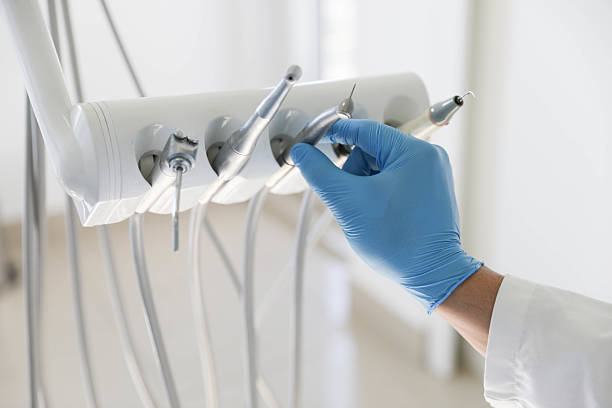 Professional Tooth Extraction technician working in East Williston, NY